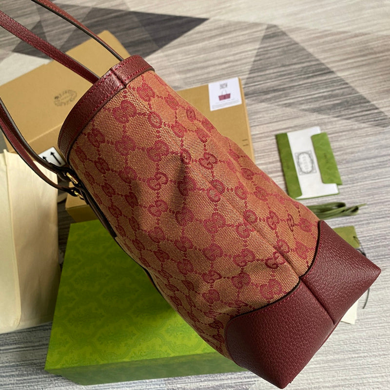Side profile of modern statement women's handbag – women's luxury accessory