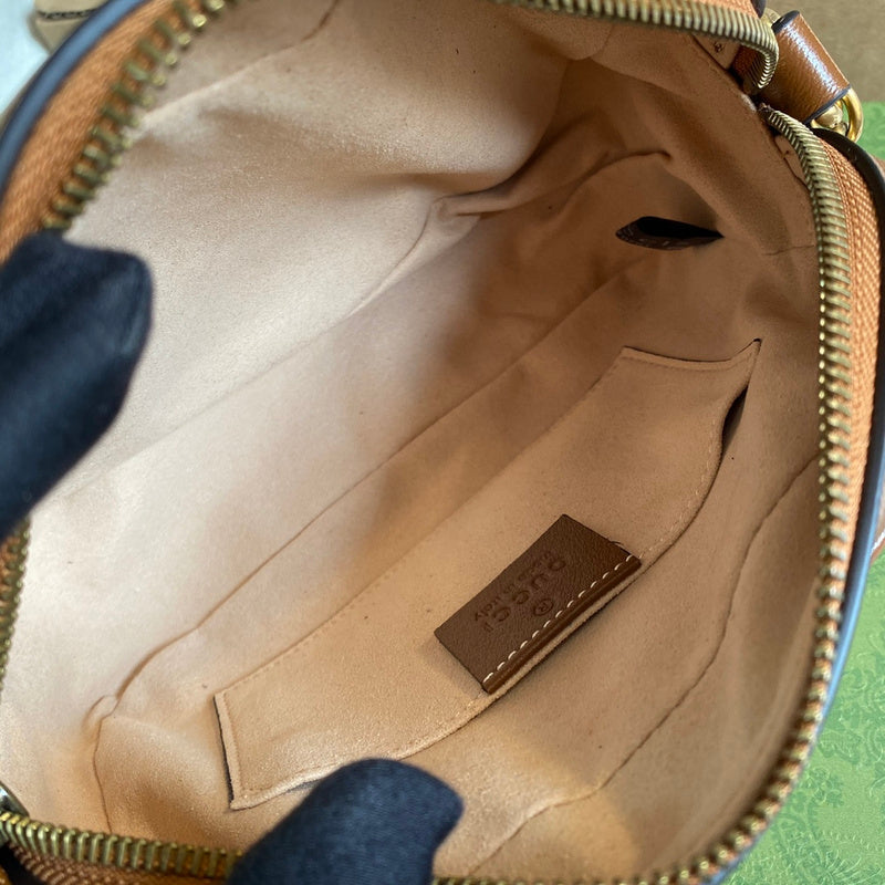 Close-up detail of signature sleek women's handbag – women's designer-style accessory