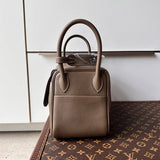  Timeless top-handle bag front view 19