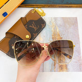 Lifestyle view of Louis Vuitton unisex sunglasses