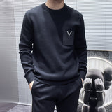 Close-up detail shot of Louis Vuitton luxury clothing with relaxed-fit cut
