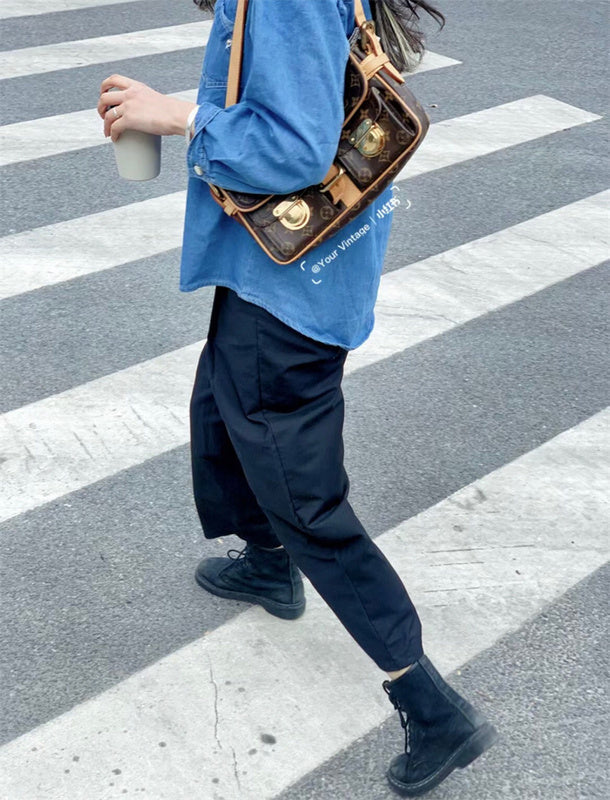  Understated top-handle bag carried on shoulder 10