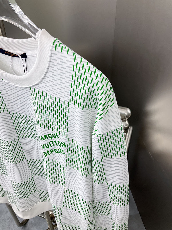 Full styled look of Louis Vuitton luxury clothing with label-forward styling