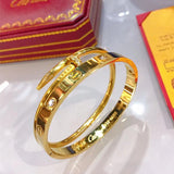 Front view of Cartier unisex jewelry piece
