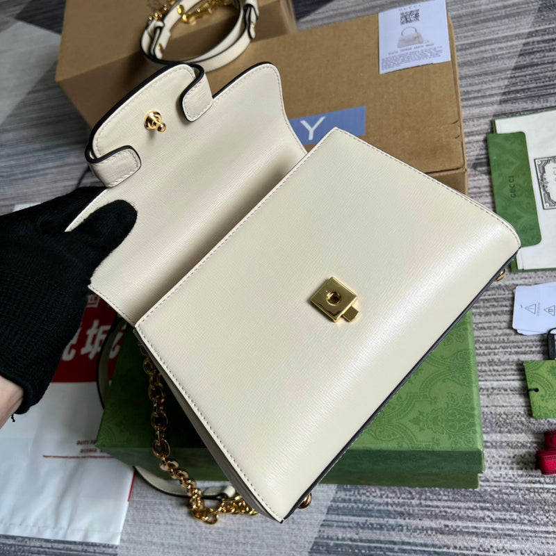 Close-up detail of signature sleek women's handbag – women's luxury accessory