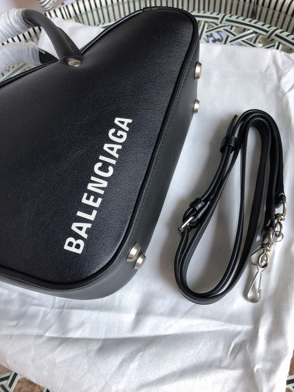 Back view of refined signature women's handbag – women's luxury handbag