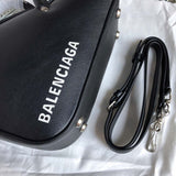 Back view of refined signature women's handbag – women's luxury handbag