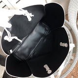 Side profile of sleek chic women's handbag – women's premium purse