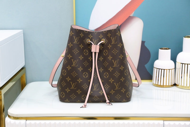 Side profile of signature structured women's handbag – women's luxury accessory