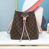 Side profile of signature structured women's handbag – women's luxury accessory