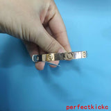 Lifestyle view of Cartier unisex jewelry piece