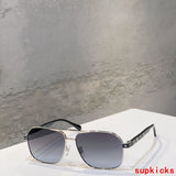 Close-up detail view of Louis Vuitton unisex sunglasses