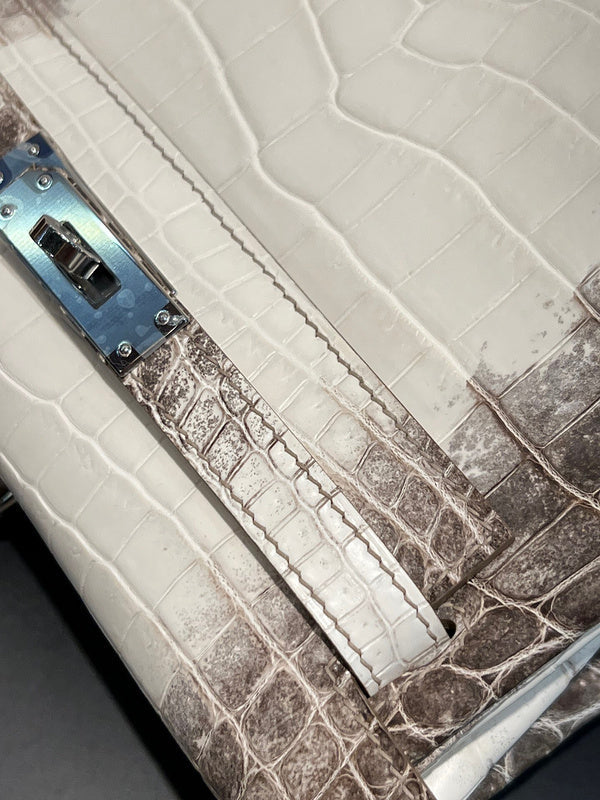 Side view of curated structured handbag