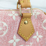 Side profile of modern signature women's handbag – women's statement bag