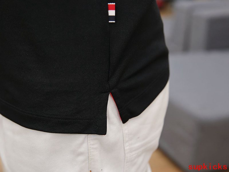 Back view of Moncler luxury clothing with logo-detail design