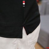 Back view of Moncler luxury clothing with logo-detail design