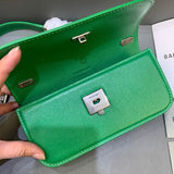 Understated Faux Leather Handbag - Signature Hardware Accents | Women's Designer-Inspired Purse #421 - styled full view (image 7) of designer-inspired handbag