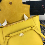 Side profile of statement premium women's handbag – women's luxury accessory