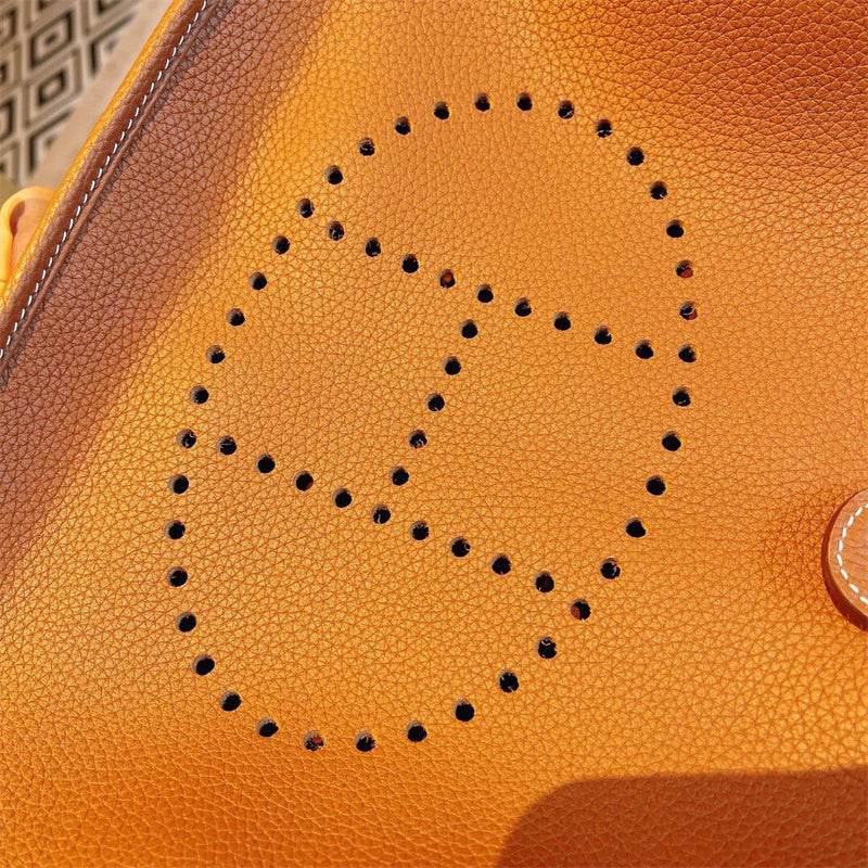  Streamlined top-handle bag carried on shoulder 10