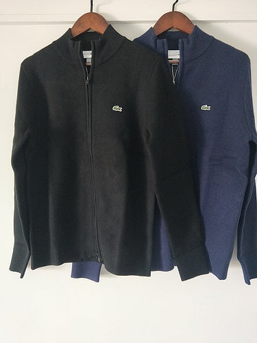 Close-up detail shot of Lacoste luxury clothing with monogram-inspired silhouette