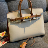 Side view of poised structured handbag