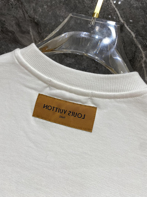 Front view of Louis Vuitton luxury clothing with label-forward styling
