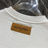 Front view of Louis Vuitton luxury clothing with label-forward styling