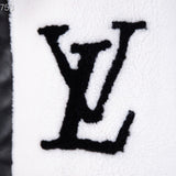 Close-up detail shot of Louis Vuitton luxury clothing with signature branding