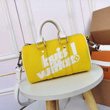 Front view of premium chic women's handbag – women's statement bag