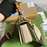 Side view of clean-lined structured handbag