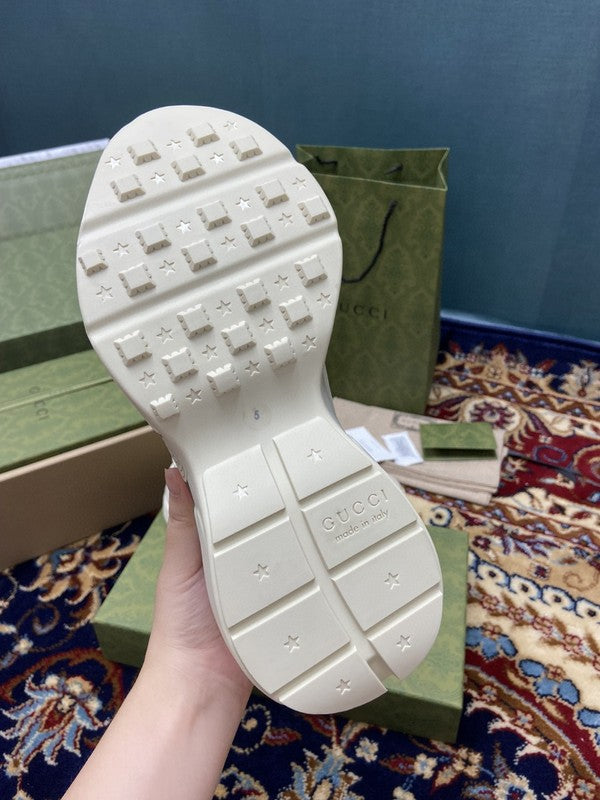 Gucci sneakers detailed view showing premium designer craftsmanship