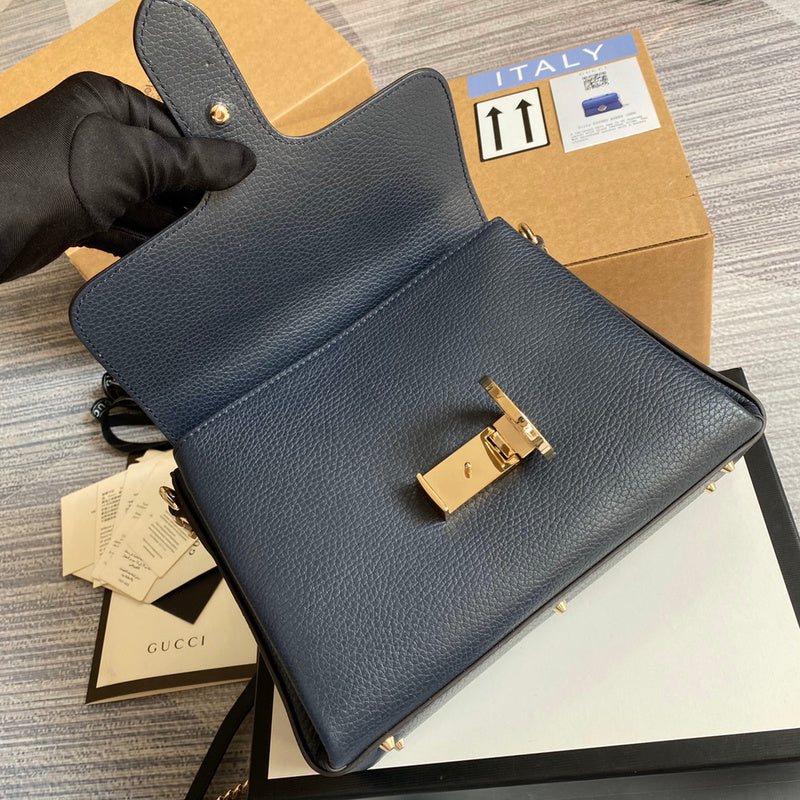 Styled lifestyle shot of modern sleek women's handbag – women's designer-style accessory