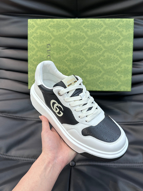 Side profile of Gucci all-black sneakers retro runner design
