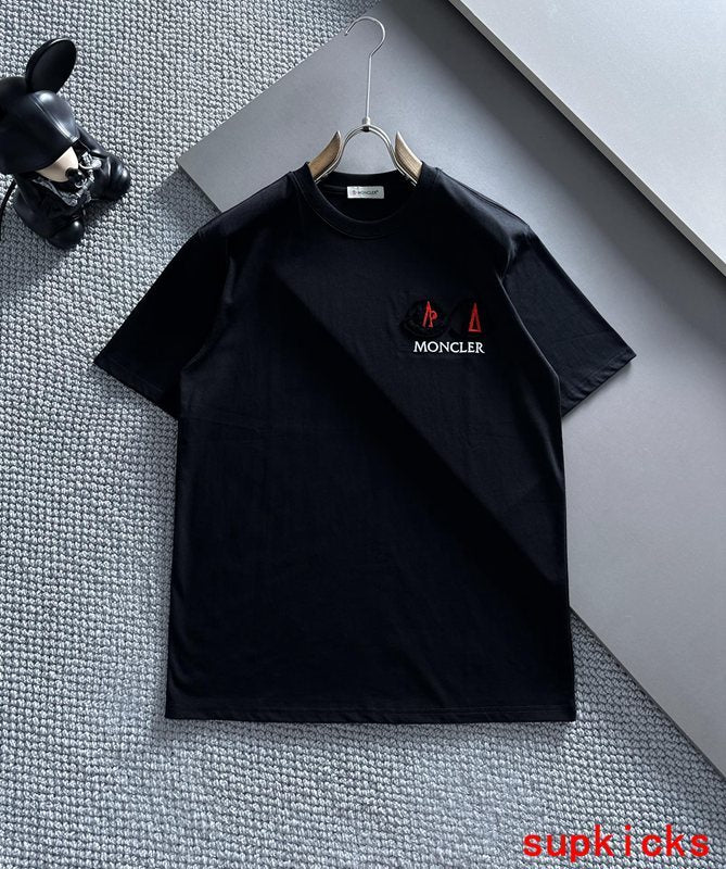 Back view of Moncler luxury clothing with signature branding