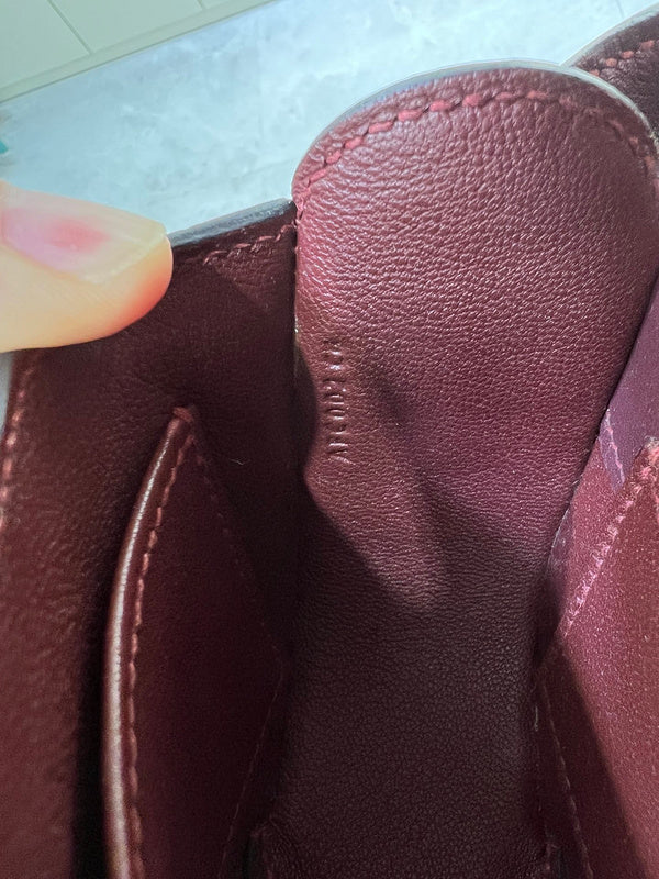 Side view of graceful structured handbag