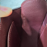 Side view of graceful structured handbag