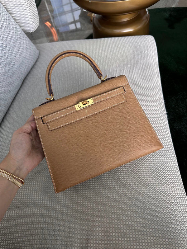  Streamlined top-handle bag carried on shoulder 10