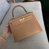  Streamlined top-handle bag carried on shoulder 10