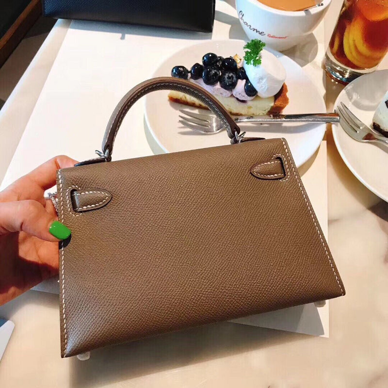 Side view of understated structured handbag
