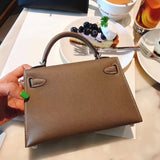 Side view of understated structured handbag