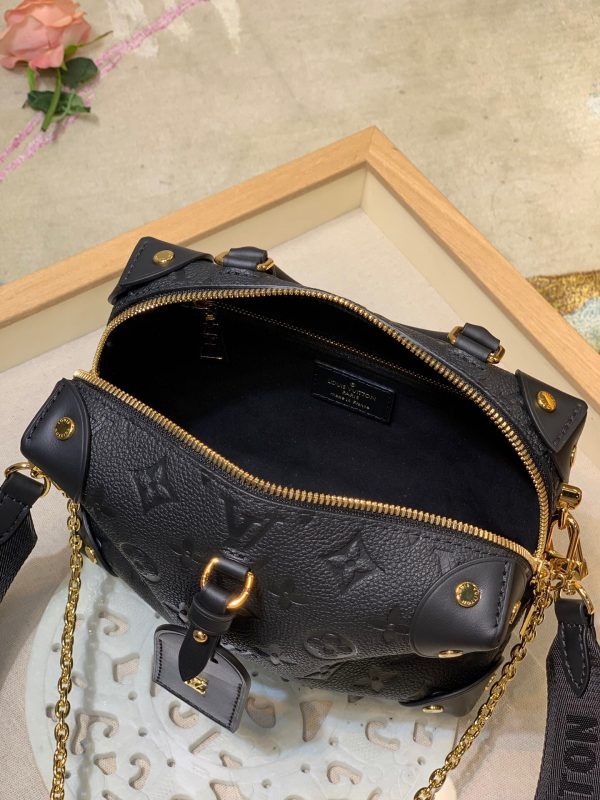 Back view of elevated classic women's handbag – women's statement bag