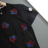 Flat lay presentation of Moncler luxury clothing with relaxed-fit cut