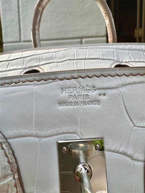  contemporary top-handle bag detail view showing craftsmanship 8