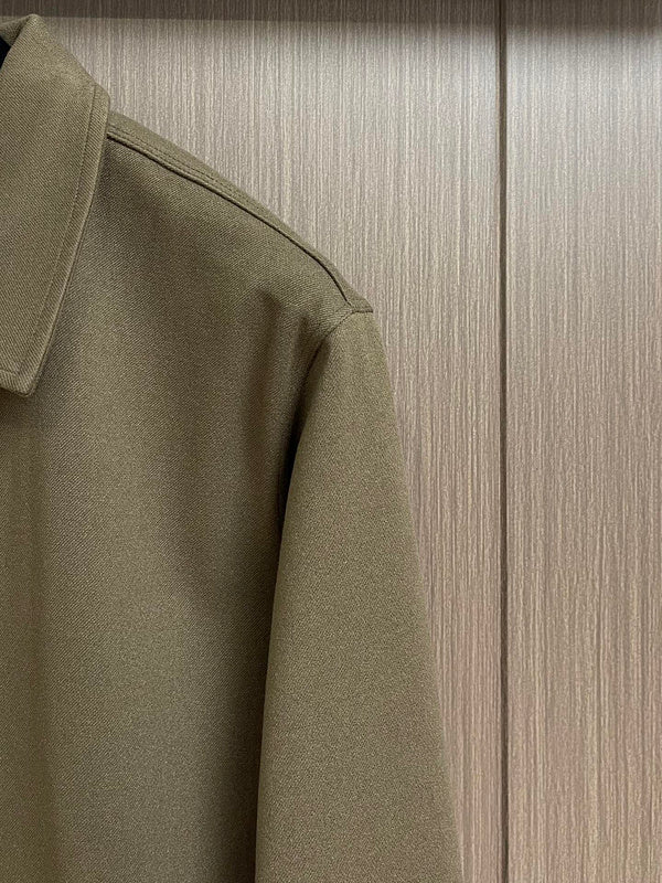Full styled look of Louis Vuitton luxury clothing with signature branding