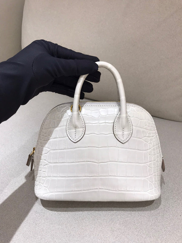 Side view of sleek structured handbag
