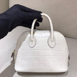 Side view of sleek structured handbag