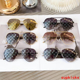 Lifestyle view of Louis Vuitton unisex sunglasses
