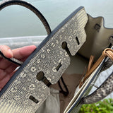 Side view of statement structured handbag