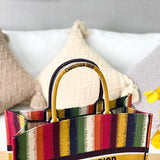 Side profile of modern statement women's handbag – women's luxury accessory