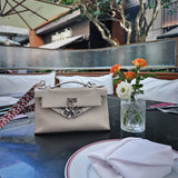 Close-up detail of graceful bag design